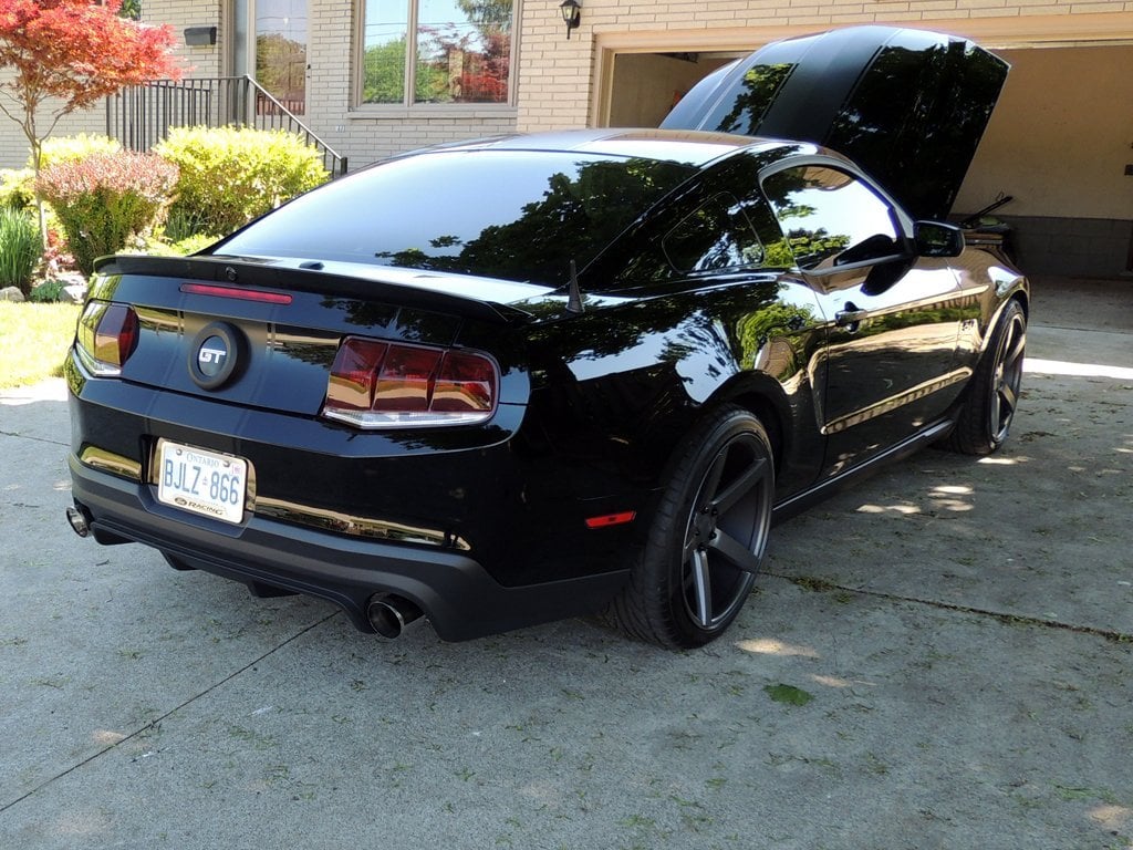Raxiom Aero Tail Lights; Black Housing; Smoked Lens (10-12 Mustang)