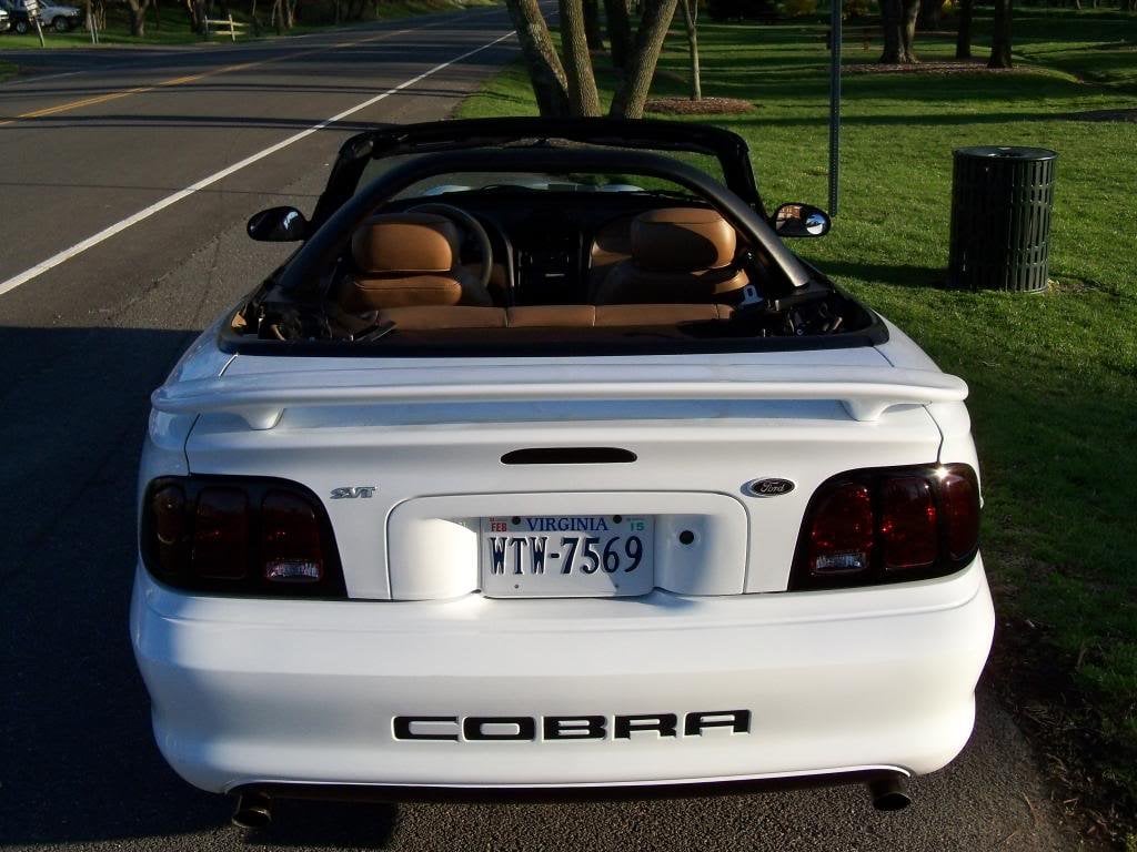 Raxiom Tail Lights; Black Housing; Smoked Lens (96-98 Mustang)