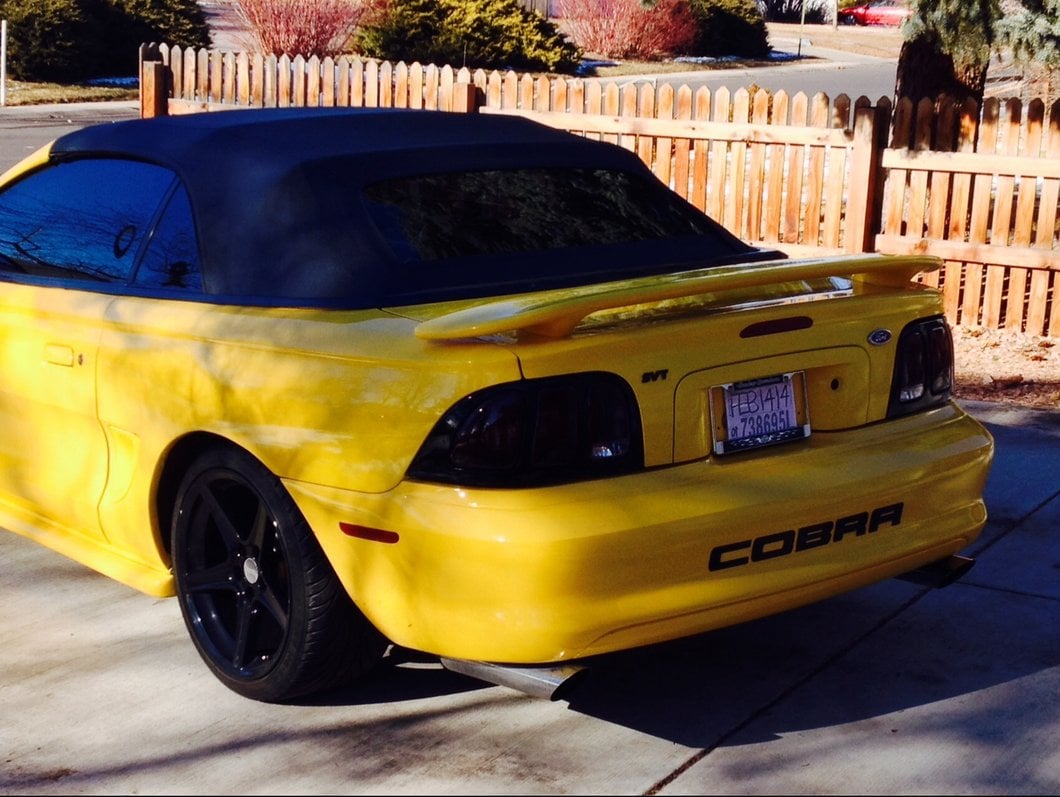 Raxiom Tail Lights and Sequential Tail Light Kit; Black Housing; Smoked Lens (94-98 Mustang)