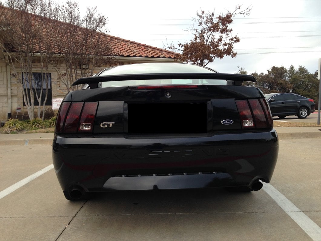 Raxiom Tail Lights and Sequential Tail Light Kit; Black Housing; Smoked Lens (99-04 Mustang, Excluding 99-01 Cobra)