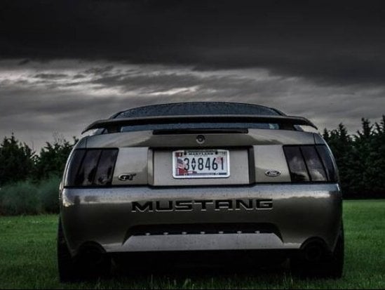 Raxiom Tail Lights; Black Housing; Smoked Lens (99-04 Mustang, Excluding 99-01 Cobra)