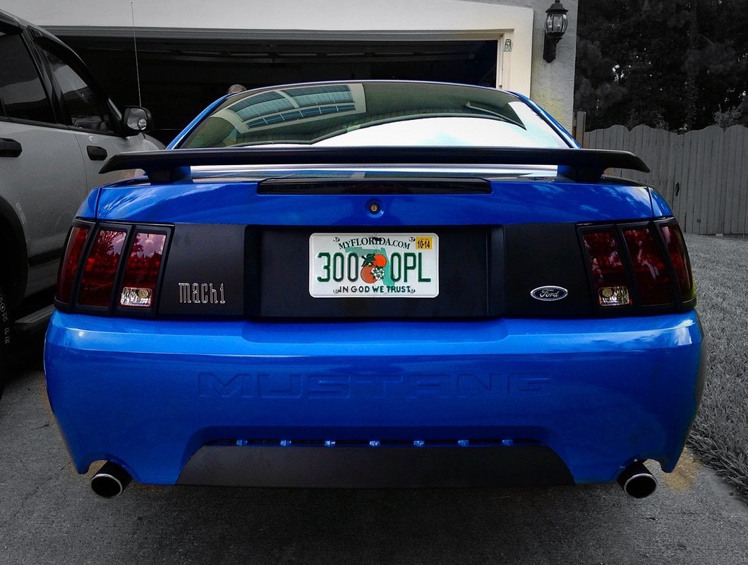 Raxiom Tail Lights and Sequential Tail Light Kit; Black Housing; Smoked Lens (99-04 Mustang, Excluding 99-01 Cobra)