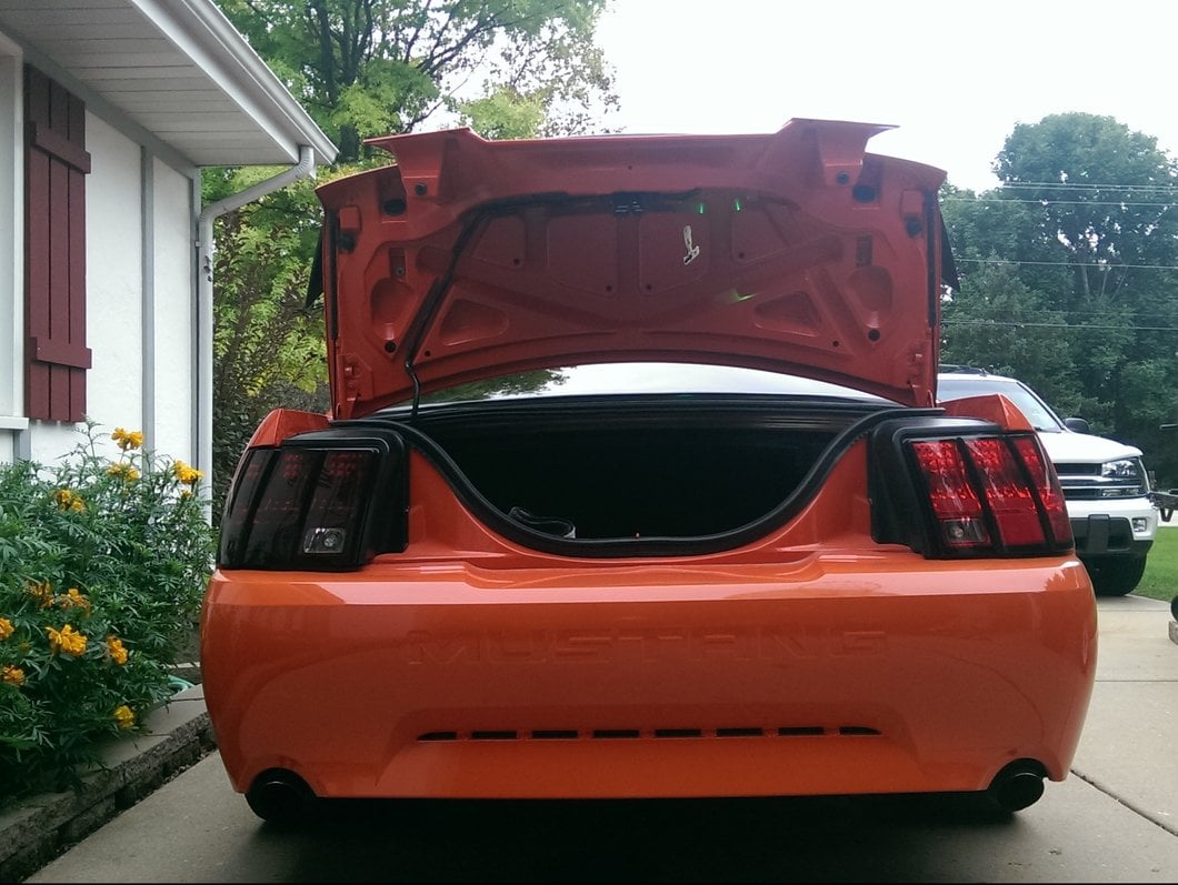 Raxiom Tail Lights and Sequential Tail Light Kit; Black Housing; Smoked Lens (99-04 Mustang, Excluding 99-01 Cobra)