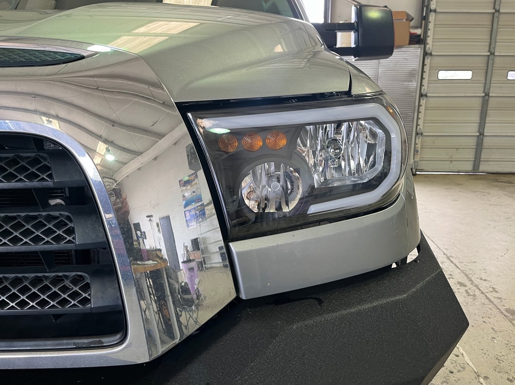 Raxiom Axial Series Headlights with LED Bar; Black Housing; Clear Lens (07-13 Tundra w/o Level Adjuster)