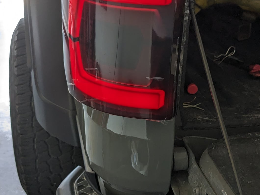 Raxiom Low Profile LED Tail Lights; Black Housing; Smoked Lens (20-25 Jeep Gladiator JT w/ Factory Halogen Tail Lights & w/o Blind Spot Detection))