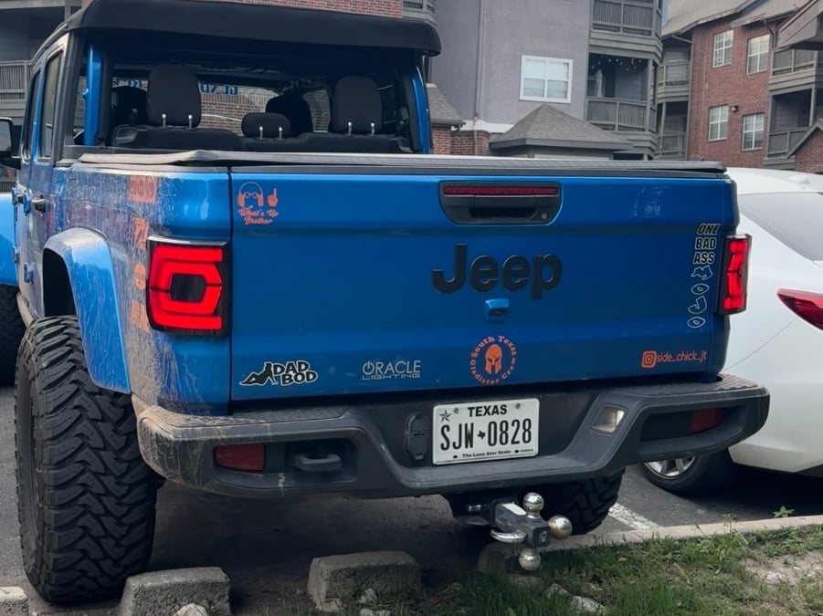 Raxiom Low Profile LED Tail Lights; Black Housing; Smoked Lens (20-25 Jeep Gladiator JT w/ Factory Halogen Tail Lights & w/o Blind Spot Detection))