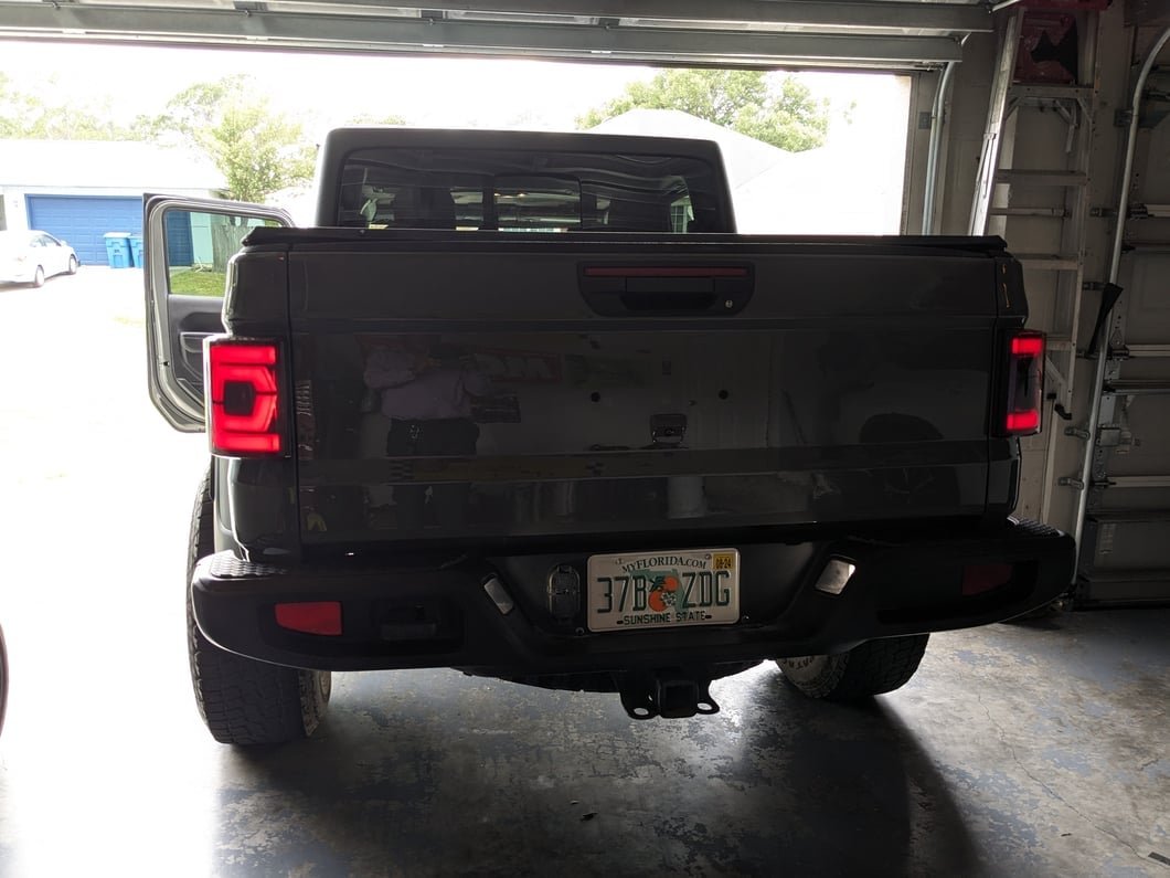 Raxiom Low Profile LED Tail Lights; Black Housing; Smoked Lens (20-25 Jeep Gladiator JT w/ Factory Halogen Tail Lights & w/o Blind Spot Detection))