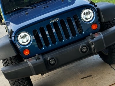 Raxiom Axial Series 7-Inch LED Headlights with DRL; Black Housing; Clear Lens (07-18 Jeep Wrangler JK)