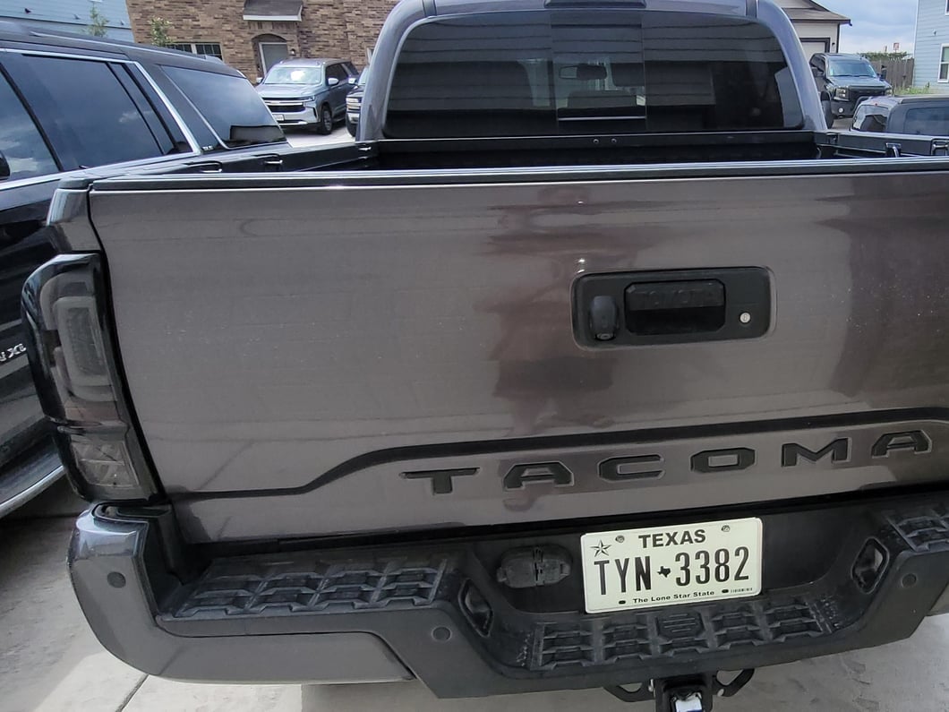 Raxiom XW Series Sequential LED Tail Lights; Black Housing, Smoked Lens (16-23 Tacoma)