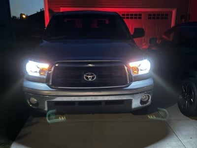 Raxiom Axial Series Projector Headlights with Sequential LED Bar; Black Housing; Clear Lens (07-13 Tundra w/o Level Adjuster)