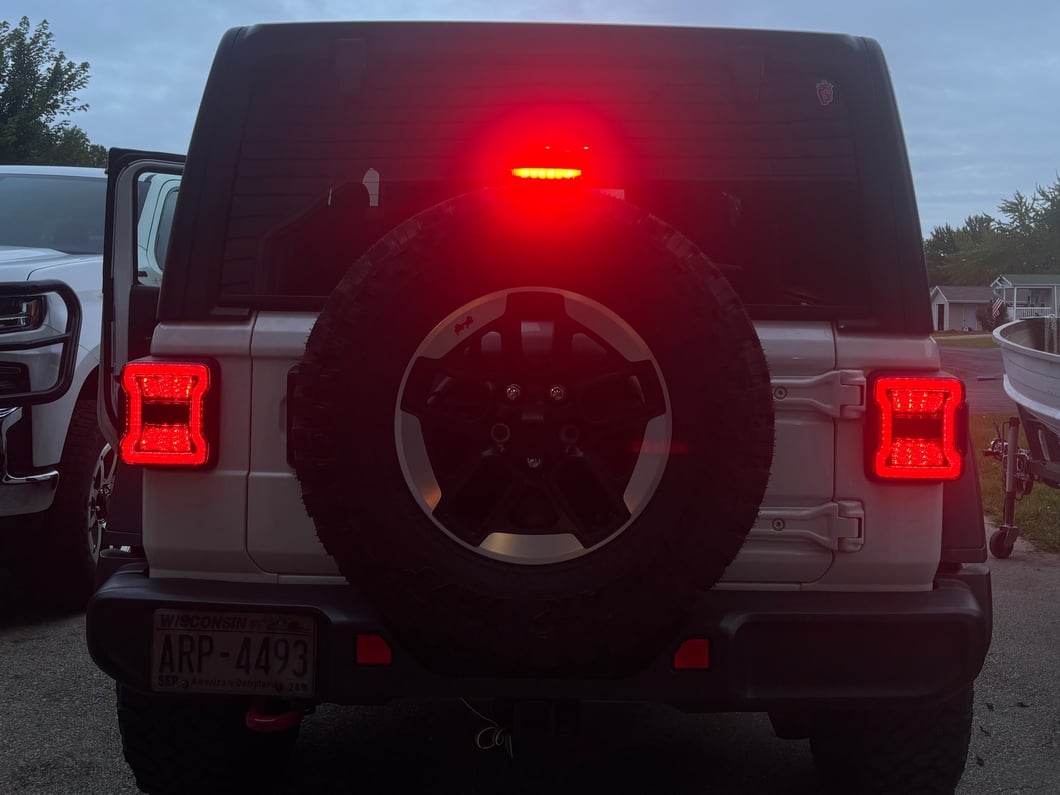 Raxiom LED Tail Lights; Red Housing; Smoked Lens (18-25 Jeep Wrangler JL w/ Factory Halogen Tail Lights & w/o Blind Spot Detection)
