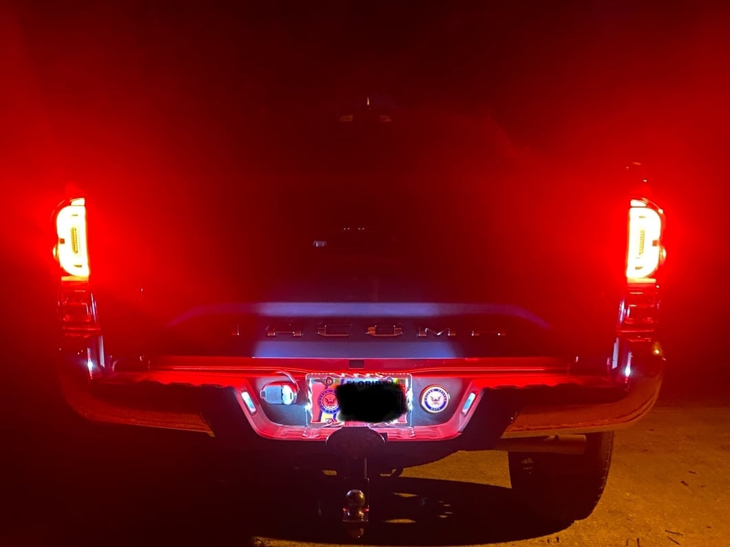 Raxiom XW Series Sequential LED Tail Lights; Black Housing; Clear Lens (16-23 Tacoma)
