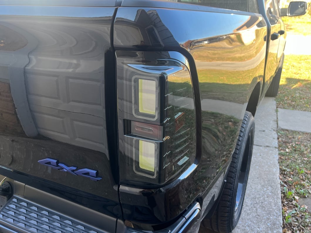 Raxiom CXR Series LED Tail Lights; Black Housing; Smoked Lens (19-24 RAM 1500 w/ Factory Halogen Tail Lights)