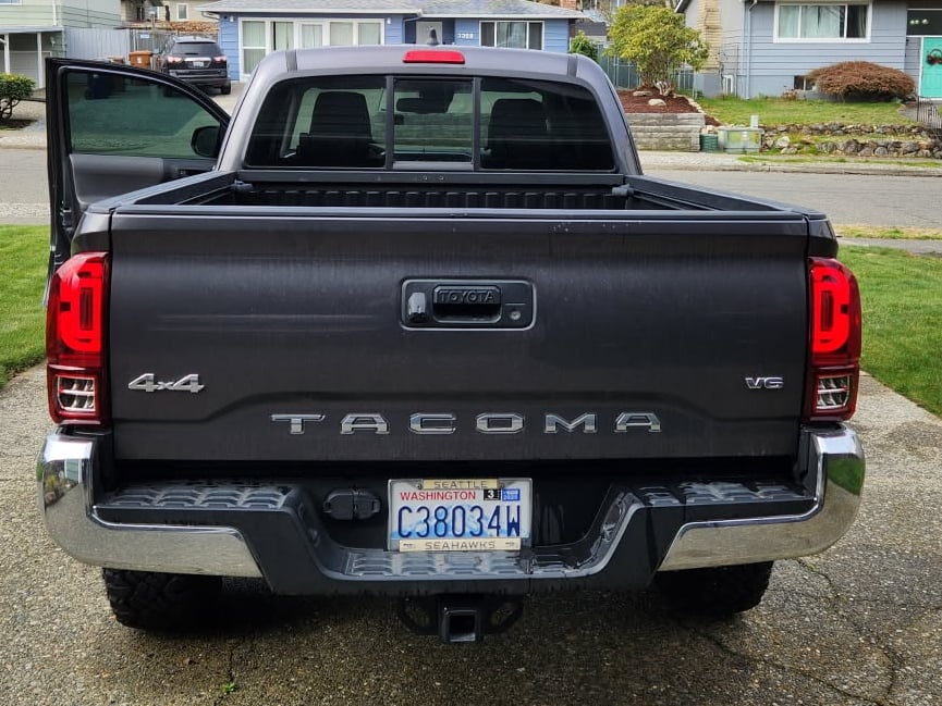 Raxiom XW Series Sequential LED Tail Lights; Black Housing, Red Lens (16-23 Tacoma)