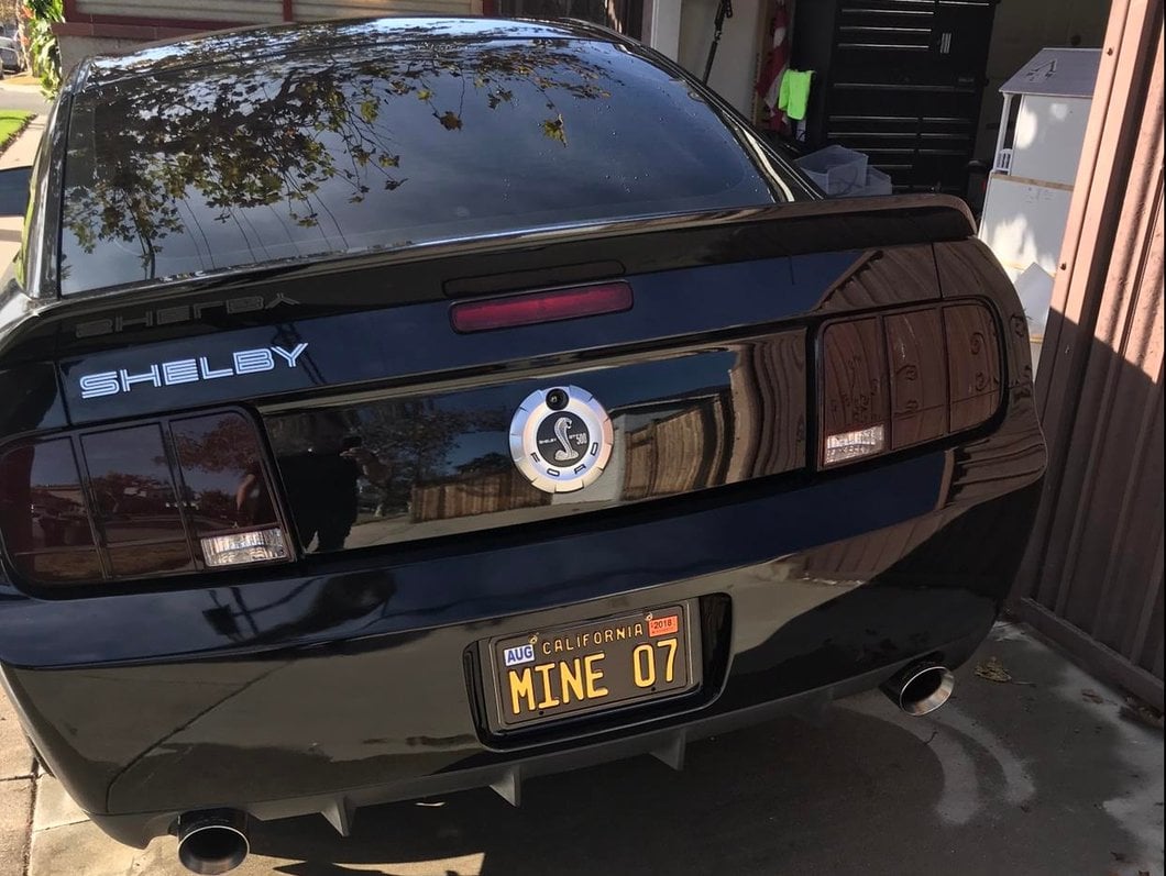 Raxiom Tail Lights and Sequential Tail Light Kit; Black Housing; Smoked Lens (05-09 Mustang)