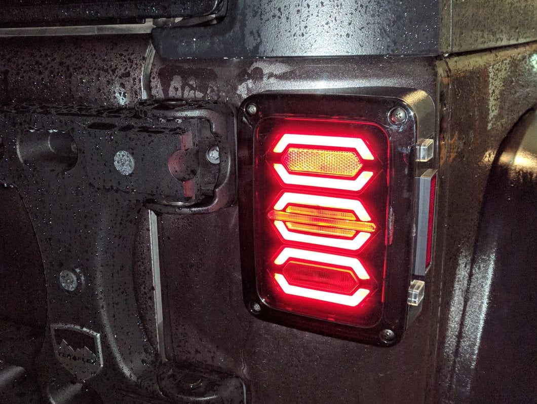 Raxiom LED Tail Lights; Black Housing; Smoked Lens (07-18 Jeep Wrangler JK)