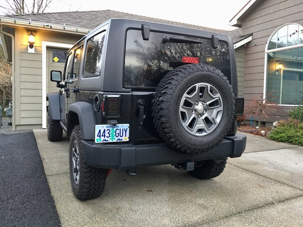 Raxiom LED Tail Lights; Black Housing; Smoked Lens (07-18 Jeep Wrangler JK)