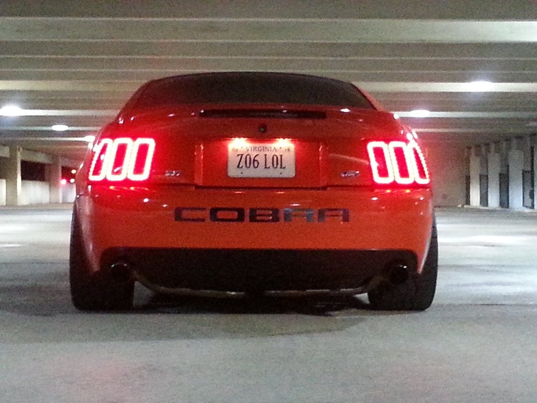 Raxiom Icon LED Tail Lights; Black Housing; Smoked Lens (99-04 Mustang, Excluding 99-01 Cobra)