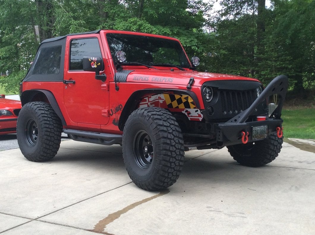 Raxiom LED Tail Lights; Black Housing; Smoked Lens (07-18 Jeep Wrangler JK)