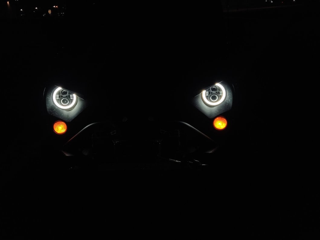 Raxiom Axial Series LED Halo Headlights with DRL and Amber Turn Signals; Black Housing; Clear Lens (97-18 Jeep Wrangler TJ & JK)