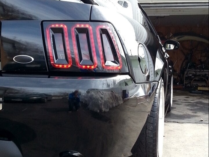 Raxiom Icon LED Tail Lights; Black Housing; Smoked Lens (99-04 Mustang, Excluding 99-01 Cobra)