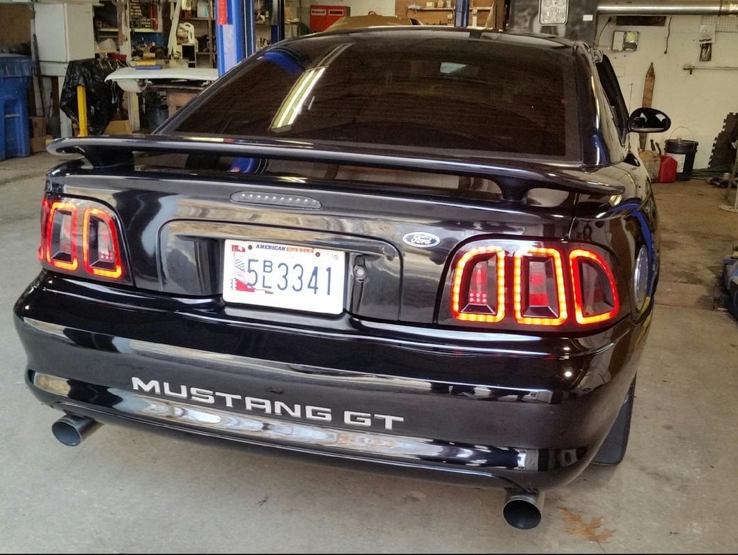 Raxiom Icon LED Tail Lights; Black Housing; Smoked Lens (96-98 Mustang)