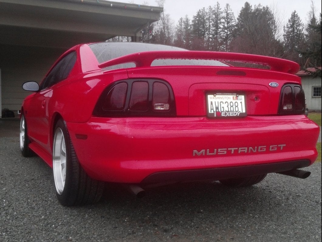 Raxiom Tail Lights and Sequential Tail Light Kit; Black Housing; Smoked Lens (94-98 Mustang)