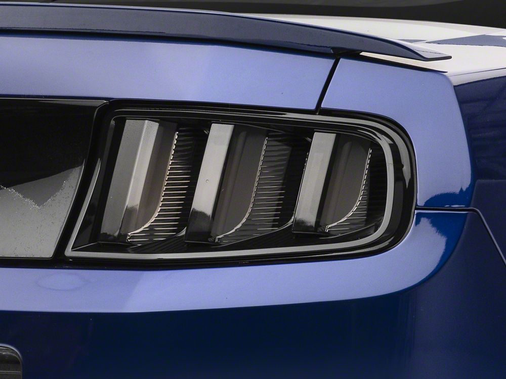 Raxiom Vector V2 Tail Lights; Black Housing; Clear Lens (13-14 Mustang)