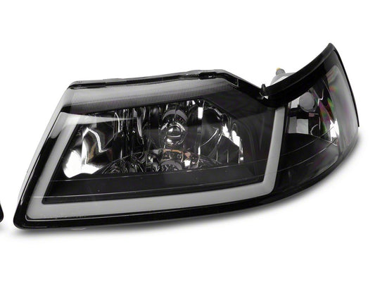 Raxiom Axial Series Headlights with LED Bar; Black Housing; Clear Lens (99-04 Mustang)