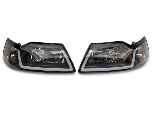 Raxiom Axial Series Headlights with Sequential LED Bar; Black Housing; Clear Lens (99-04 Mustang)