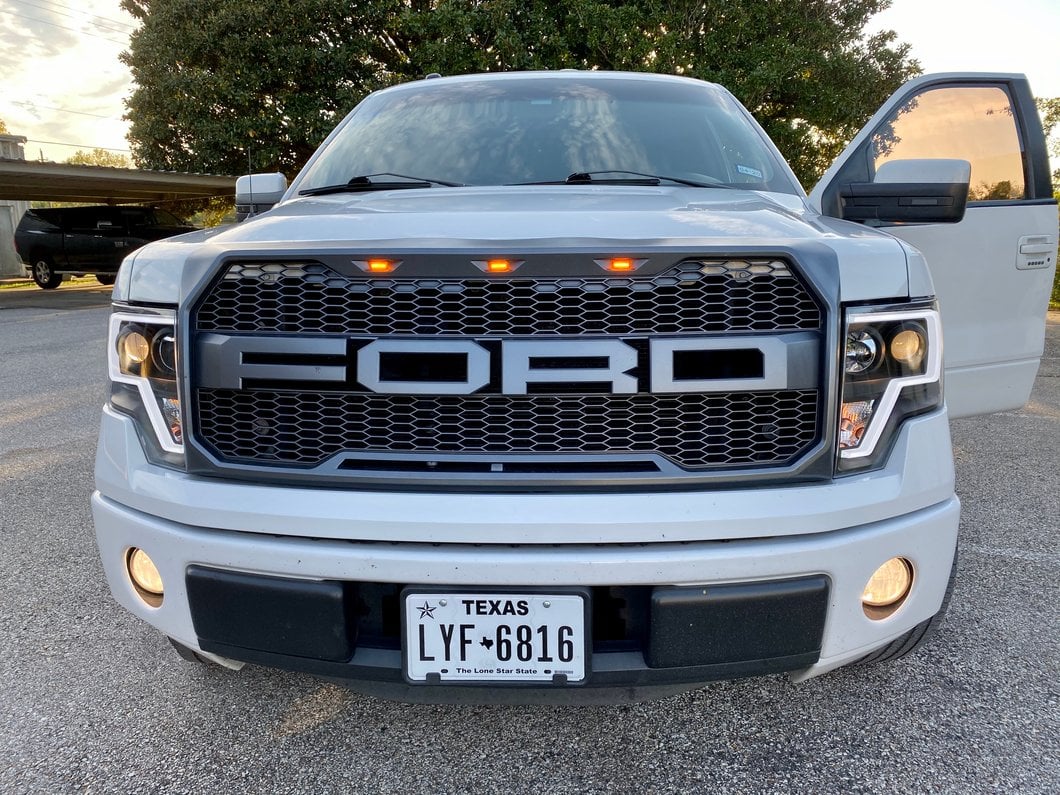 Raxiom Projector Headlights with LED Accent; Black Housing; Clear Lens (09-14 F-150 w/ Factory Halogen Headlights)