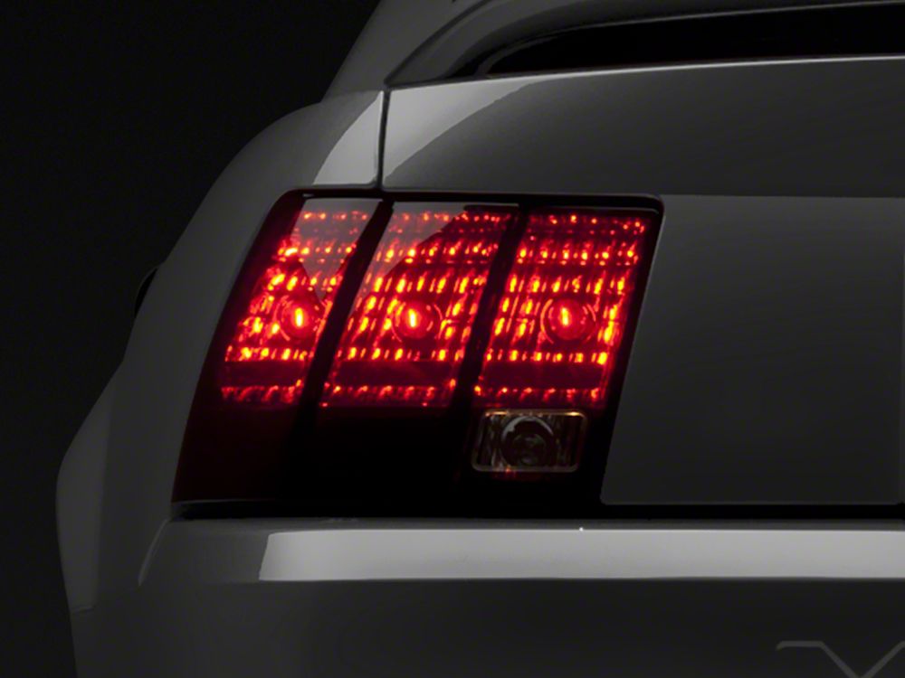 Raxiom Tail Lights; Black Housing; Smoked Lens (99-04 Mustang, Excluding 99-01 Cobra)