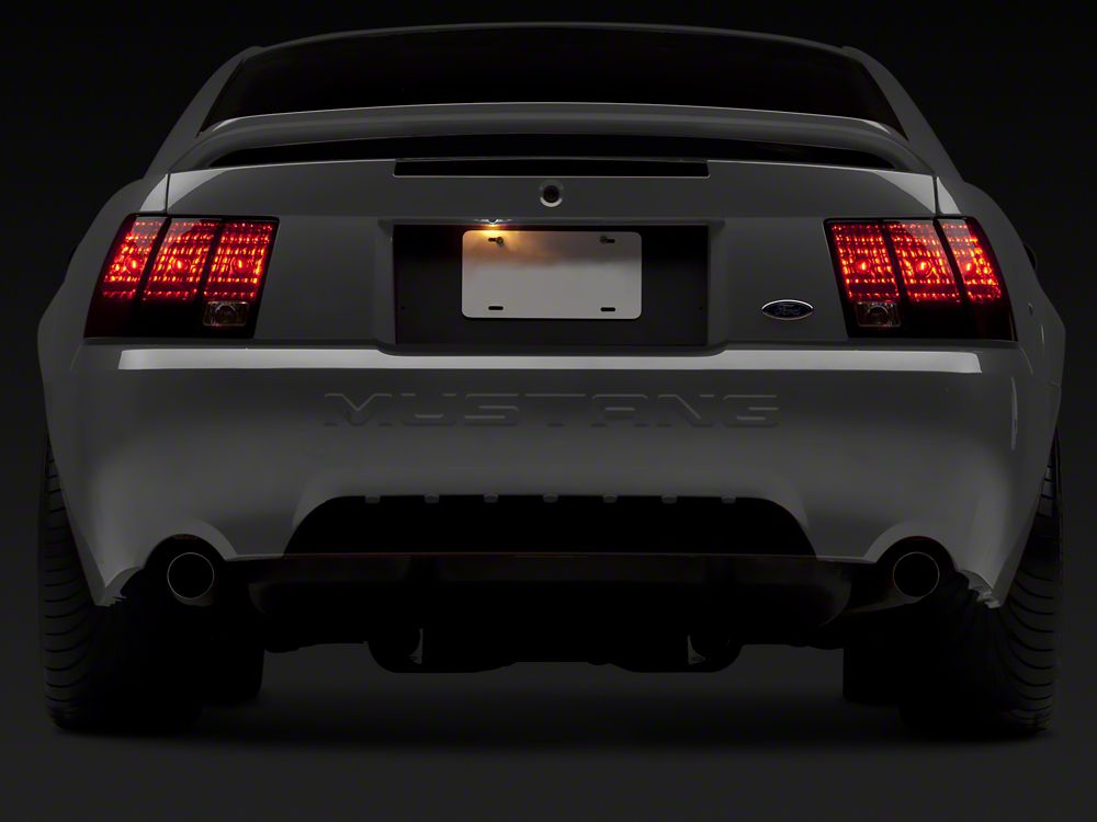Raxiom Tail Lights; Black Housing; Smoked Lens (99-04 Mustang, Excluding 99-01 Cobra)
