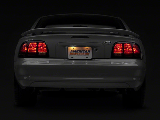 Raxiom Tail Lights; Black Housing; Smoked Lens (96-98 Mustang)