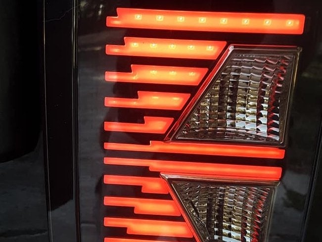 Raxiom Axial Series Vision LED Tail Lights; Black Housing; Smoked Lens (07-18 Jeep Wrangler JK)