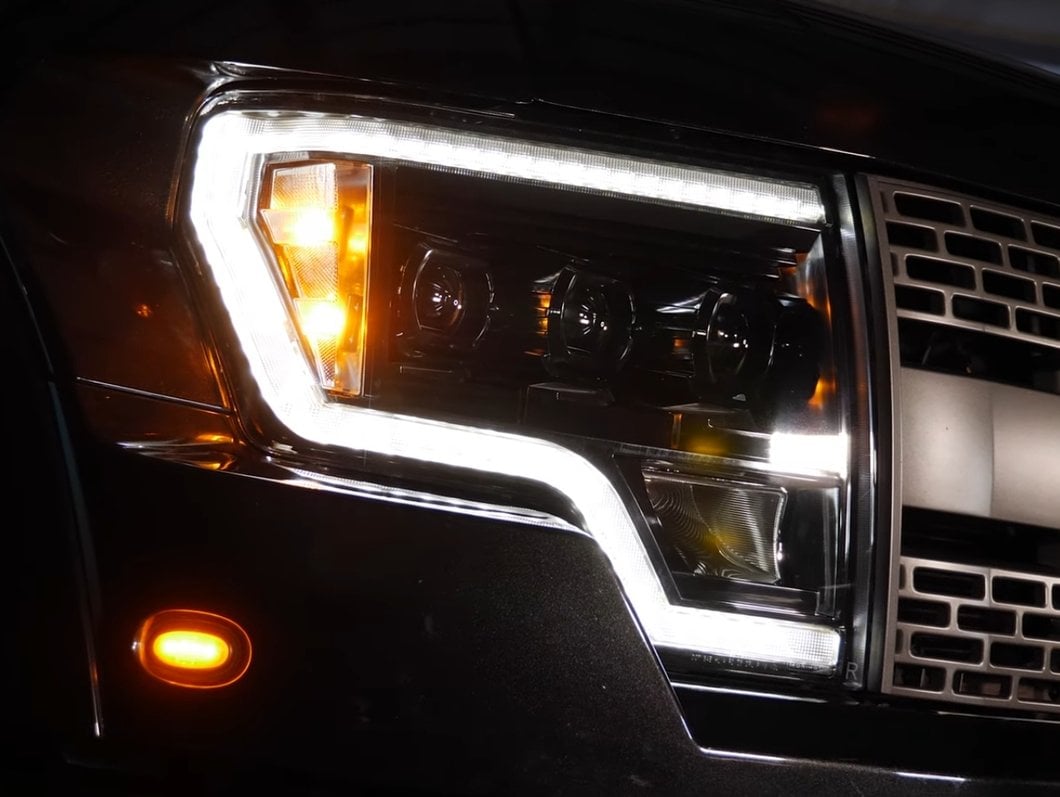 Raxiom G4 Projector Headlights; Black Housing; Clear Lens (09-14 F-150 w/ Factory Halogen Headlights)