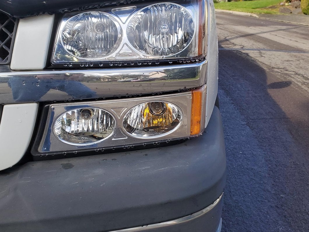 Raxiom Axial Series Crystal Headlights; Chrome Housing; Clear Lens (03-06 Silverado 1500)