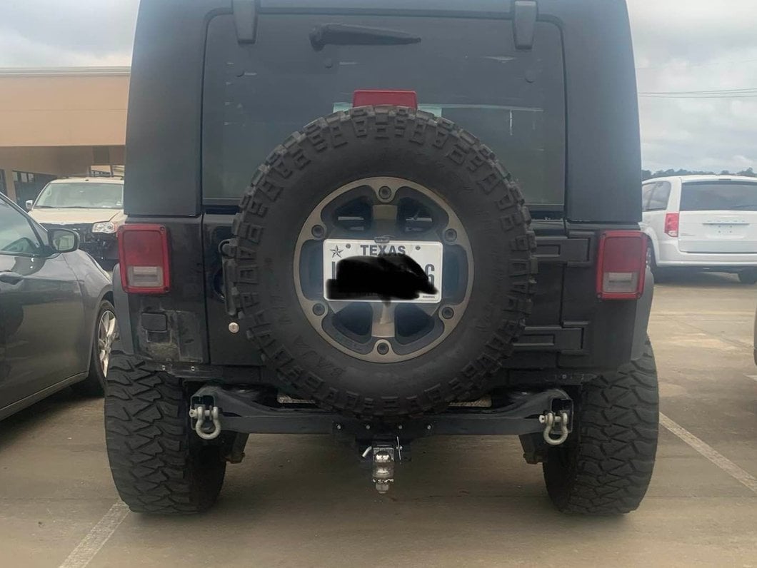 Raxiom Axial Series License Plate Bracket with LED Brake Light (07-18 Jeep Wrangler JK)
