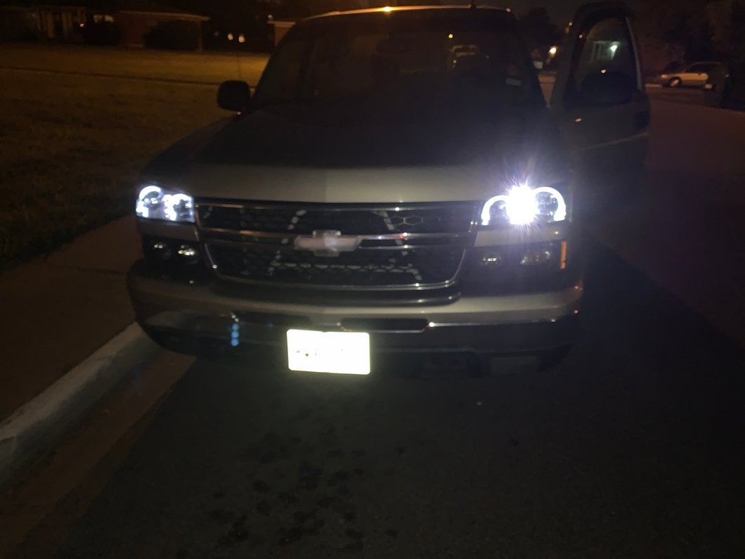 Raxiom Dual LED Halo Projector Headlights; Black Housing; Clear Lens (03-06 Silverado 1500)