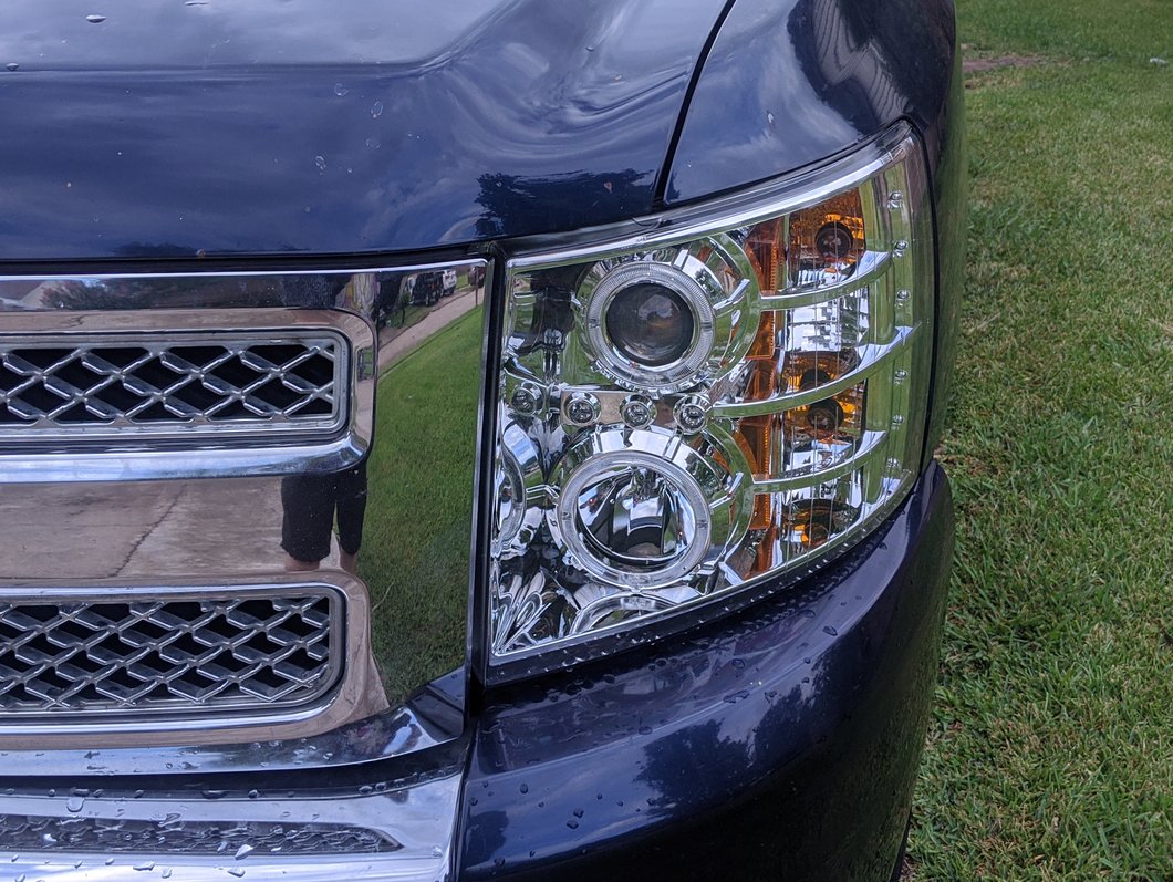 Raxiom LED Halo Projector Headlights; Chrome Housing; Clear Lens (07-13 Silverado 1500)