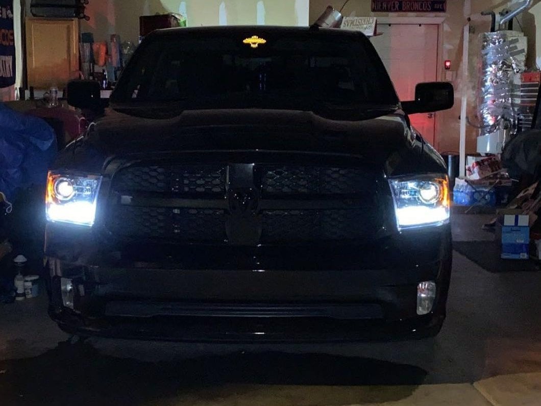 Raxiom LED Halo Headlights with Switchback Turn Signals; Black Housing; Clear Lens (09-18 RAM 1500 w/ Factory Halogen Non-Projector Headlights)