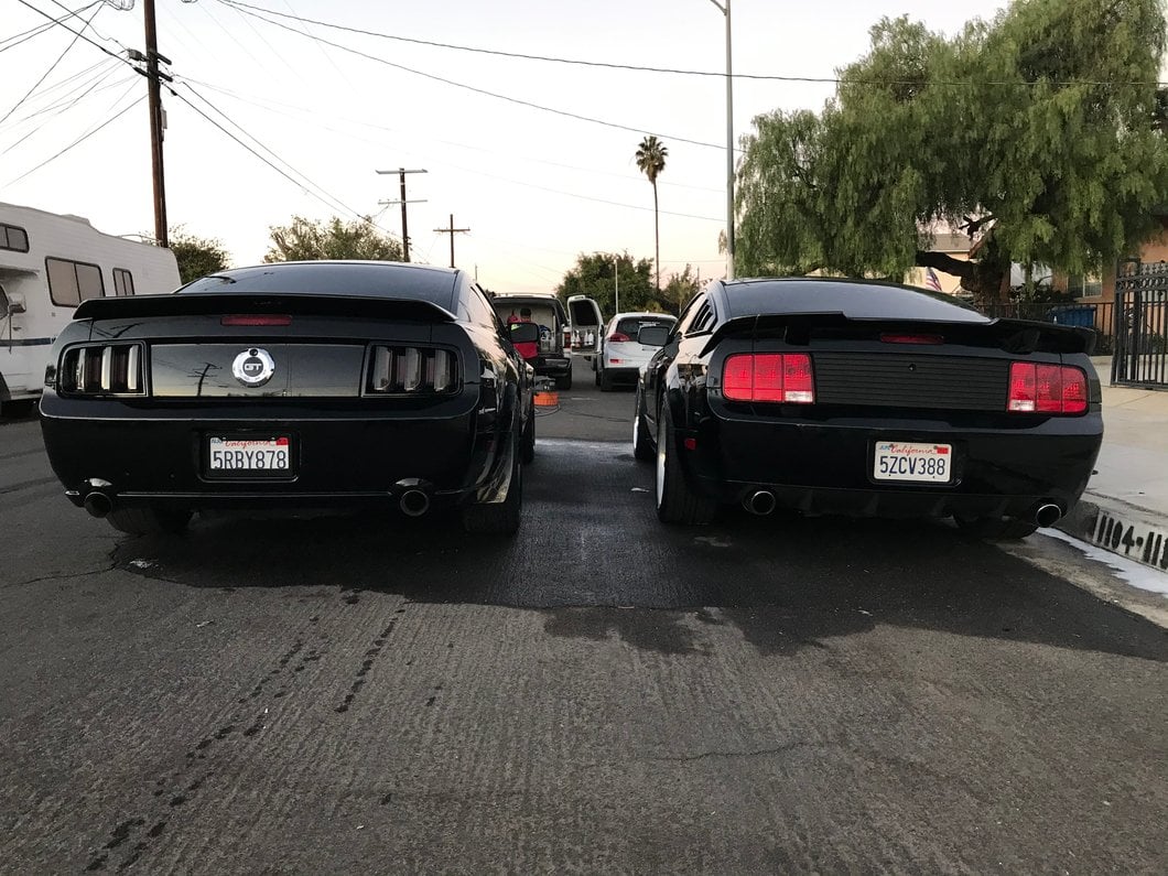 Raxiom Vector V2 LED Tail Lights; Black Housing; Smoked Lens (05-09 Mustang)