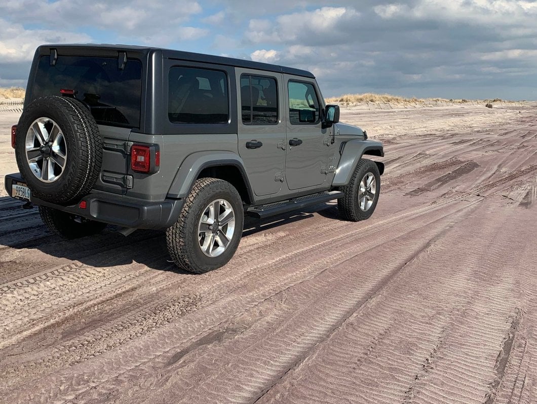 Raxiom LED Tail Lights; Black Housing; Red Lens (18-25 Jeep Wrangler JL w/ Factory Halogen Tail Lights & w/o Blind Spot Detection)