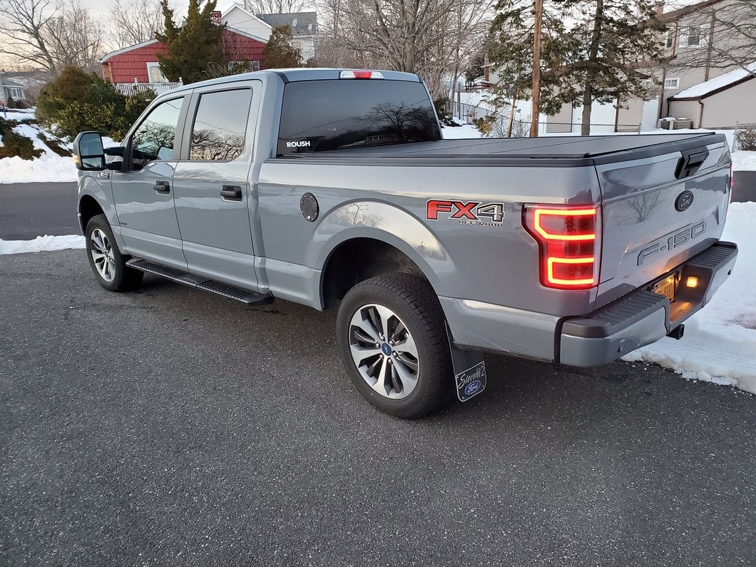 Raxiom Axial Series LED Tail Lights with Sequential Turn Signals; Black Housing; Clear Lens (18-20 F-150 w/ Factory Halogen Non-BLIS Tail Lights)