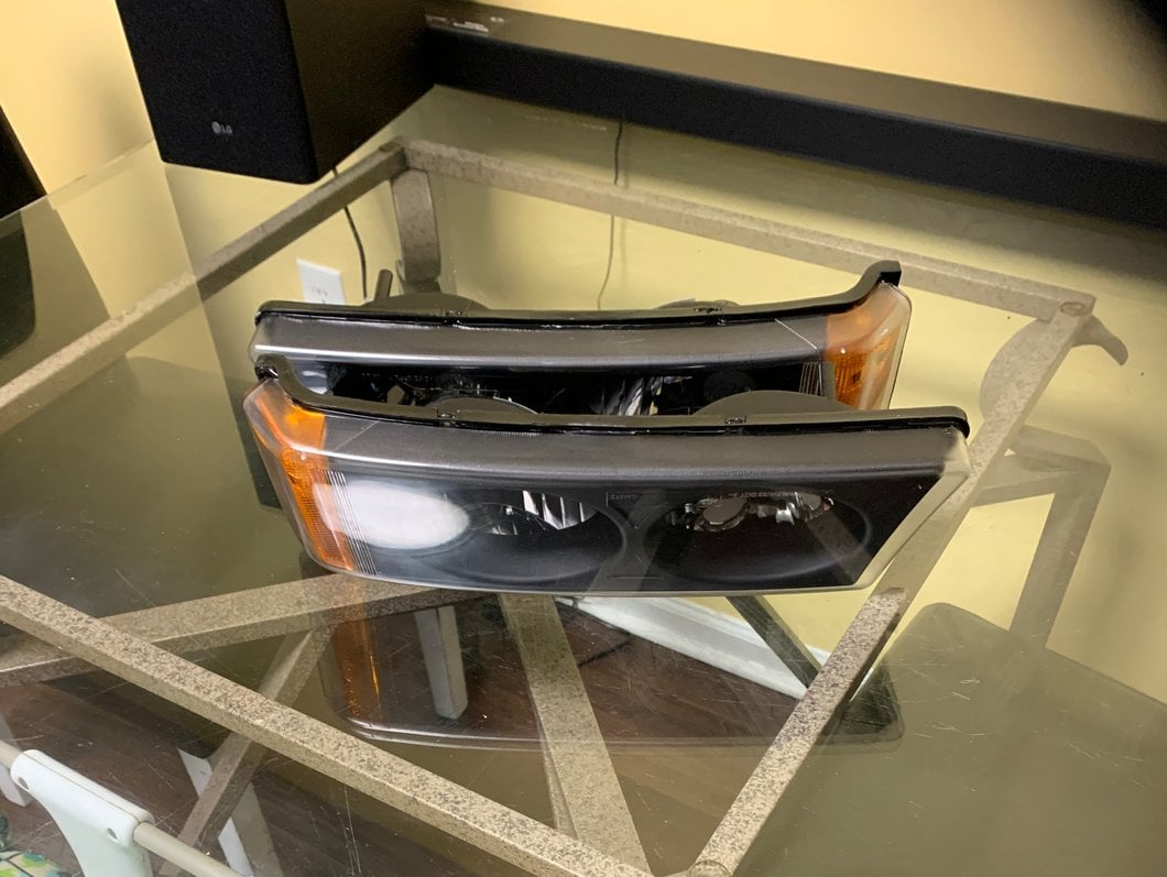 Raxiom Dual LED Halo Projector Headlights; Black Housing; Clear Lens (03-06 Silverado 1500)