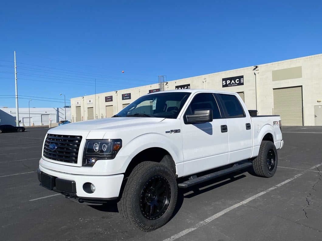 Raxiom Super White LED Halo Projector Headlights; Black Housing; Clear Lens (09-14 F-150 w/ Factory Halogen Headlights)