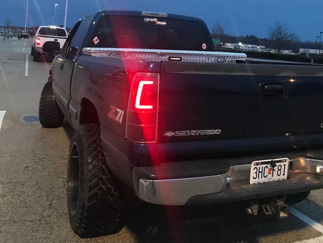 Raxiom Axial Series LED Tail Lights; Black Housing; Clear Lens (99-02 Silverado 1500 Fleetside)