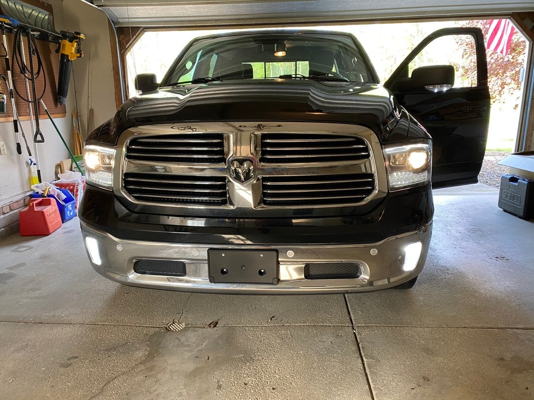 Raxiom LED Projector Headlights with Switchback Turn Signals; Black Housing; Clear Lens (09-18 RAM 1500 w/ Factory Halogen Non-Projector Headlights)