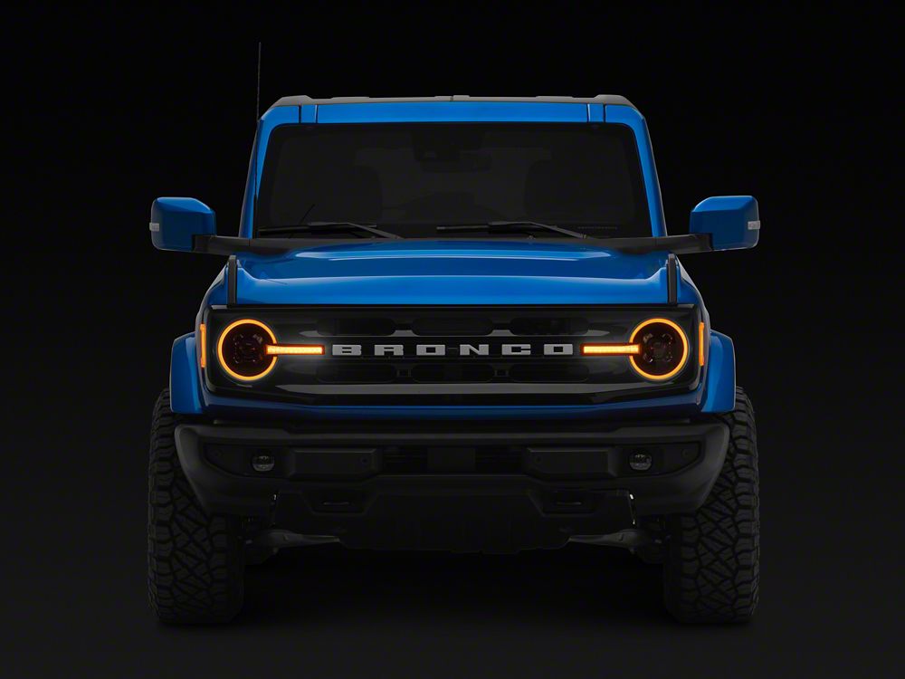 Raxiom LED Halo Headlights with Amber Backlight; Black Housing; Clear Lens (21-25 Bronco)