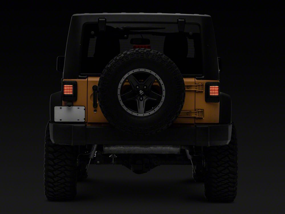 Raxiom LED Tail Lights; Black Housing; Smoked Lens (07-18 Jeep Wrangler JK)